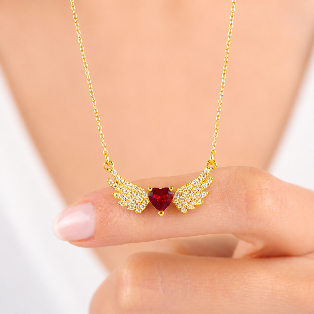Ruby Angel Wing Heart Necklace In Gold