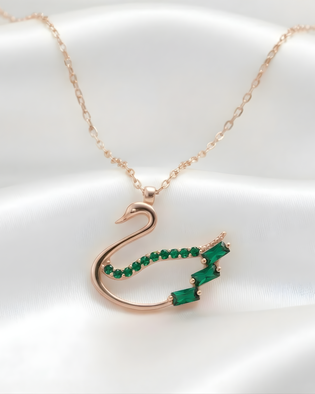 Emerald Baguette Sparkling Swan Necklace In Rose Gold