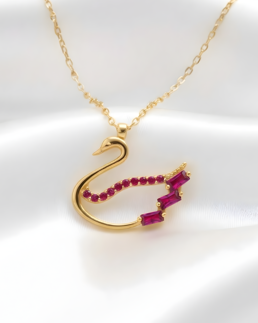 Ruby Baguette Sparkling Swan Necklace In Gold
