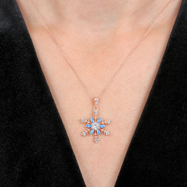 Sky Blue Crystal Snowflake Necklace In Rose Gold