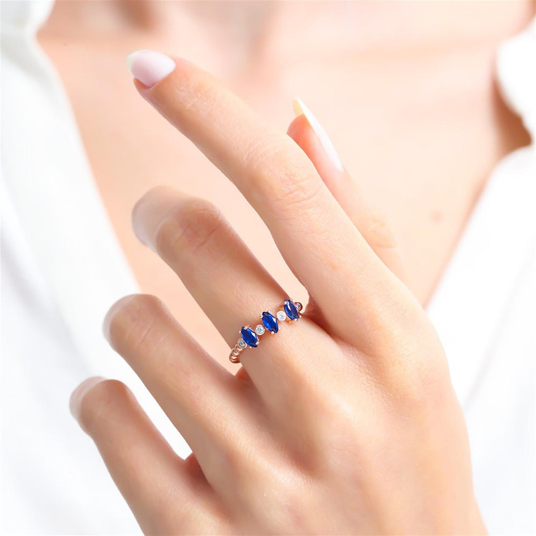 Sapphire Shuttle Band Ring in Rose Gold